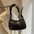Black woven shoulder bag with silver butterfly charm and stylish ruched strap detail - Black