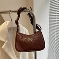 Dark brown woven leather crossbody bag with metallic butterfly and pleated strap - Dark Brown