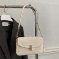 Chic cream white faux crocodile shoulder bag with golden chain and minimalist lock - White