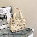 Chic beige corduroy tote bag with bear smile print and functional front pocket - White