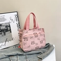 Pink corduroy tote bag featuring brown cartoon bear prints and nylon handles - Pink