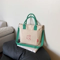 Sac seau en toile blanc cassé avec anses vertes et motif d'ours rouge - Vert