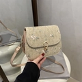 Beige straw crossbody bag with floral embroidery and gold teardrop twist lock buckle - Khaki