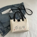 Mini cream leather bucket bag featuring cute cartoon bear prints and black straps - Black