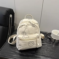 Mini mochila de pana color crema con diseño de cara sonriente y correas ajustables - Blanco