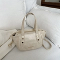 Chic beige bucket bag in vegan leather with golden rivets and adjustable strap - White