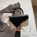 Bolso bandolera chic blanco y negro con asa trenzada y cierre metálico elegante - Negro