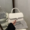 Chic white square crossbody bag with V-shaped flap detail and silver-tone hardware - White