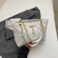 White quilted faux leather tote bag with gold chain strap and deer pendant detail - Off White