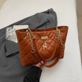 Caramel quilted tote bag with golden deer pendant and leather chain shoulder strap - Brown