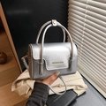 Metallic silver crossbody small square bag with top handle and golden lettering detail - Silver