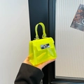 Mini Neongrün Jelly Handtasche aus PVC mit Silber-Drehverschluss und oberem Tragegriff - Grün