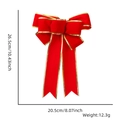 Détail d'un grand nœud de Noël en velours rouge avec bordure dorée et dimensions - Style Noeud / Velours Rouge Bordure Dorée