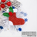 Christmas stocking hair clip with red sequins, green leaves, and white star mesh detail - Christmas Sock Style