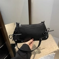 Minimalist black rectangular shoulder bag with bow details and silver studs for women - Black