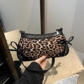 Stylish leopard print underarm bag with black leather trim and decorative bows - Leopard Black