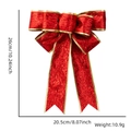 Detail view of a 26cm red velvet Christmas bow with gold trim and exact dimensions - 7-Loop Bow / Red with Gold Wire Edge