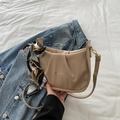 Stylish beige square shoulder bag with pleated texture and decorative silk scarf detail - Khaki