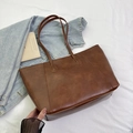 Classic brown leather tote bag with vintage texture and stylish decorative stitching - Brown