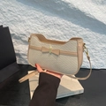 Creamy beige woven shoulder bag with bow detail and gold hardware for women - Khaki