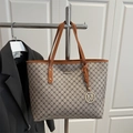 Large beige monogram tote bag with brown leather straps and gold metal pendant - Gray