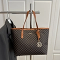 Classic monogram tote bag with brown leather handles and gold letter M pendant - Brown