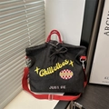 Borsa tote in denim nero con manici rossi e ricamo giallo Chill vibes sul davanti - Nero