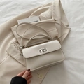 Chic beige leather square crossbody bag with silver rotating lock and top handle - Beige