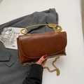 Brown leather crossbody square bag with a unique gold safety pin handle and chain - Brown