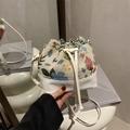 Sac seau en tweed floral et cuir blanc avec œillets dorés et cordon de serrage - Blanc