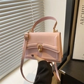 Elegant light pink square bag with gold buckle in minimalist leather crossbody style - Pink
