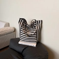 Canvas tote bag with black and white horizontal stripes and a large interior capacity - Black Side A (Striped)