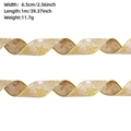 Detail showing 6.5cm wide khaki faux linen Christmas ribbon with gold snowflake print - Extra Short-Golden Snowflake