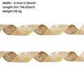 Close-up of 6.5cm wide burlap Christmas ribbon with gold snowflake patterns and dimensions - Long-Golden Snowflake