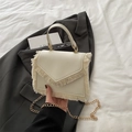 Elegant cream square crossbody bag with fringe tassels and gold chain strap detail - White