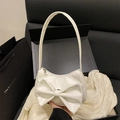 Bolso de hombro blanco elegante con un gran lazo y cremallera plateada, acabado de polipiel - Blanco