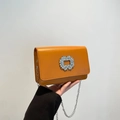 Fashionable bright orange crossbody bag with crystal buckle and silver chain strap - Brown