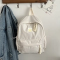 Japanese style cream white backpack with yellow smiley face and rope zipper detail - White