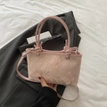 Pink lace crossbody bag with butterfly embroidery and sleek shoulder straps for women - Pink
