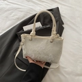 Cream canvas handbag with 3D butterfly embroidery and woven top handle for women - White