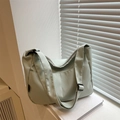 Minimalist mint green nylon crossbody bag with adjustable wide straps and multi-pockets - Green