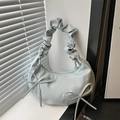 Minimalist light blue crescent shoulder bag with scrunched handle and bow accents - Blue