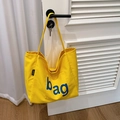 Borsa tote in tela gialla con stampa blu e tracolla resistente per la spesa - Giallo