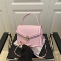 Pink faux leather square crossbody bag with gold twist lock and elegant top handle - Pink
