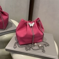 Fuchsia crocodile pattern bucket bag with silver butterfly and pearl drawstring - Rose Pink