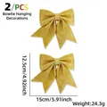 Set di 2 fiocchi natalizi glitterati oro, decorazioni da 15x12,5cm per l'albero - Oro
