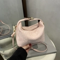 Pink snake pattern trapezoid crossbody bag with gold hardware and top handle - Pink