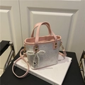 Pink leather trim bucket bag with butterfly print and pearl bow charm on white fabric - With Pearl Bow Pendant / Pink
