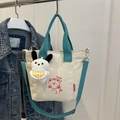 Cream canvas tote bag with teal handles, cartoon bear print and plush toy charm - With Ornament / Green