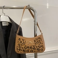 Stylish leopard print underarm bag with gold bow buckle and sleek shoulder strap - Brown
